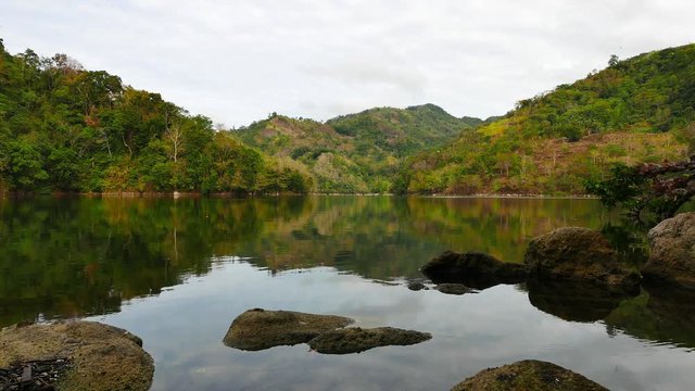 A real time clip showing the idyllic beauty of the mountain lake Balanan in Negros Oriental, Philippines. 