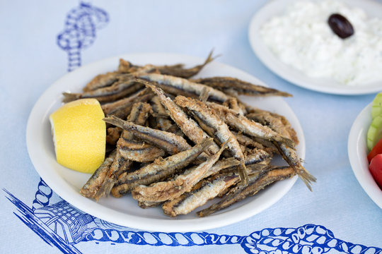 Fried anchovies, gavros in greek taverna