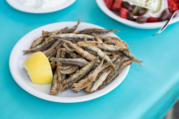 Fried anchovies, gavros in greek taverna