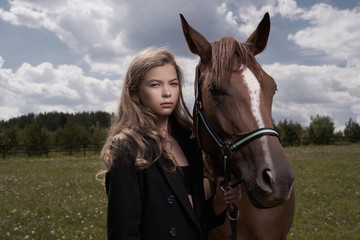 Beautiful young lady with horse