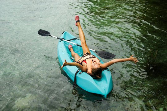 Woman lying in the kayak