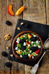 Arugula peach blackberry goat cheese salad