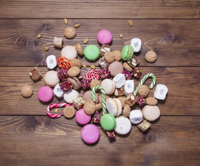 Fototapeta na wymiar Sweets on wooden background