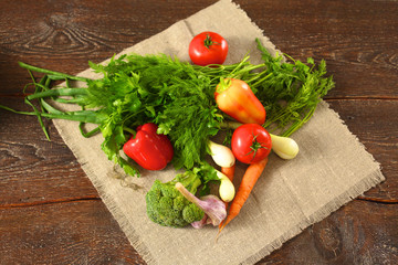 Fresh vegetables on a wooden table. Healthy food. Diet