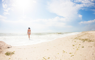 girl comes into the ocean