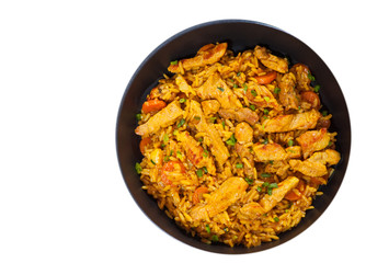 meat with rice and vegetables in a frying pan. top view. isolated on white
