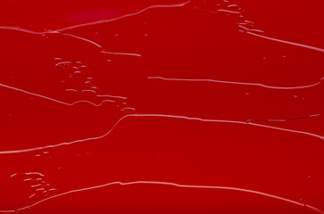 Abstract stains with oil paints of red color
