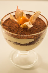 dessert tiramisu and berry physalis in kremanki