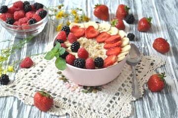 Oatmeal with berries in a bowl