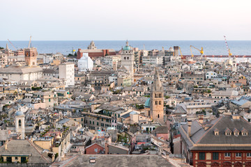 Fototapeta na wymiar Aerial view of the downtown of Genoa at the sunset