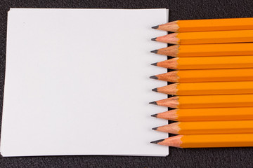 Obraz premium Simple pencils, a blank sheet