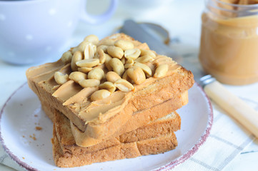 Fototapeta na wymiar peanut butter on toasted bread