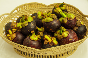 Mangosteens in the basket