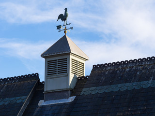 Weathervane Against Blue Sky