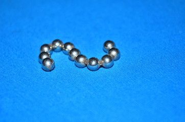 A chain of small magnetic balls.