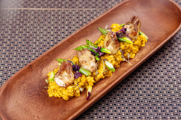 Traditional spanish rice with artichokes and asparagus.