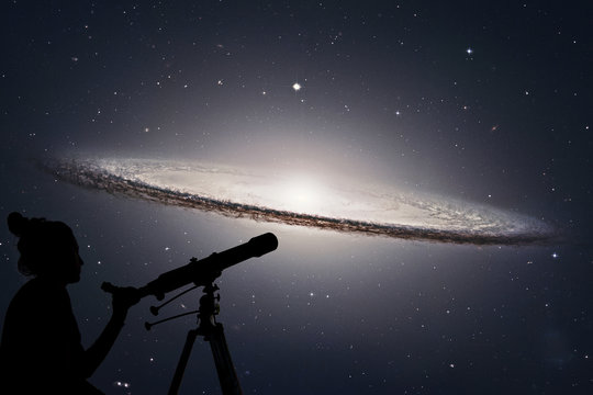 Girl looking at the stars with telescope. Sombrero Galaxy M104  in constellation Virgo.