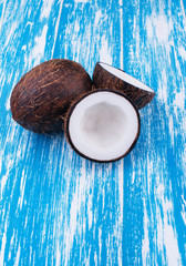 Chopped coconut with coconut milk. Milkshake. Wooden board rustic