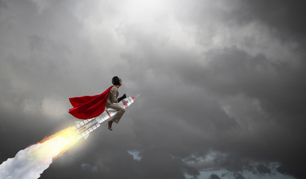 Woman on space rocket . Mixed media