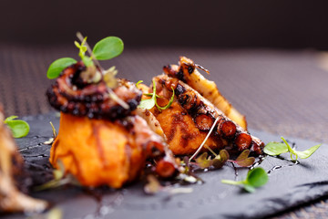 grilled octopus served with mashed potatoes