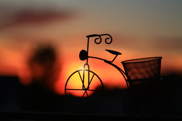 Silhouette of a bicycle against a beautiful sunset