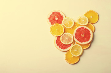 Citrus fruit Heart from slices of lemon, orange, grapefruit on white background. Love, healthy, ecology concept.
