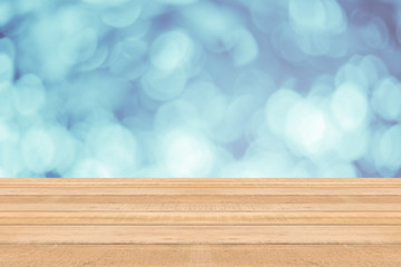 table top on blue bokeh abstract light background