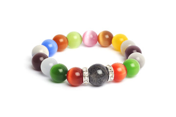 supplement a good fortune ิั Black Rutilliated Quartz colorful Cat's eye quartz stone bracelet amulet with white isolated background 