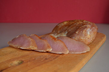 Sushi Chef Slices fresh Salmon on the sushi bar. A sushi-man slicing a salmon steak.