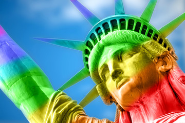 Gay equal rights and LGBT sexual freedom in America concept with the statue of liberty covered in the rainbow colors. LGBTQ community advocates for tolerance towards gender, sexuality and identity © Victor Moussa