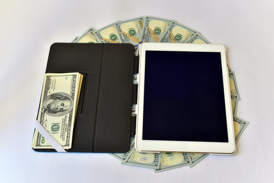 Dollar Bills Circle Stack and A Tablet PC