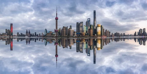 Poster landmarks of Shanghai with Huangpu river at sunrise/sunset in China. © fanjianhua
