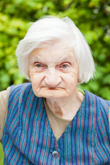 Aged woman in the garden