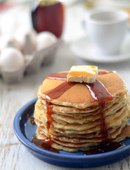 traditional pancakes with syrup and butter