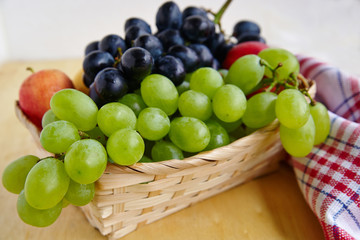 Grapes in a straw basket