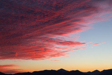 Beautiful sky with red clouds at sunset