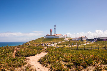 Fototapeta na wymiar Nice view of a lighthouse with the ocean in Portugal
