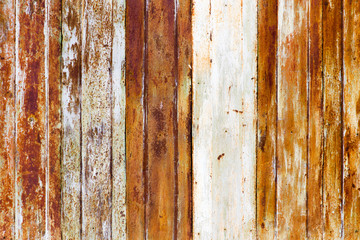 Old rusty metal fence as an abstract background