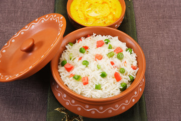 Obraz na płótnie Canvas Vegetable Pilau with Kadi or Indian Vegetable Biryani