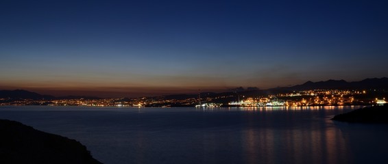 Rijeka refinery in the night with Rijeka city on the background. View from Krk / Croatia