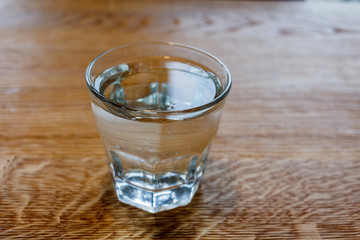 A glass of water on the table in the restaurant