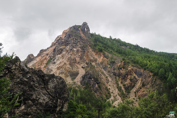 Fototapeta na wymiar Mountains scenery, wild nature landscape, rock and forest near the Bicaz gorge in Carpathians, Romania, cheile sugaului