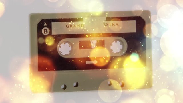 changing audio tape cassettes turn through 360 degrees