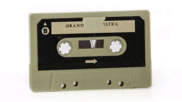 changing audio tape cassettes turn through 360 degrees