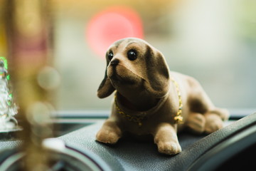 A cute brown toy dog - lovely puppy.