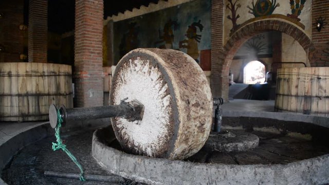 Grinding stone used in the production of mezcal in Oaxaca, Mexico