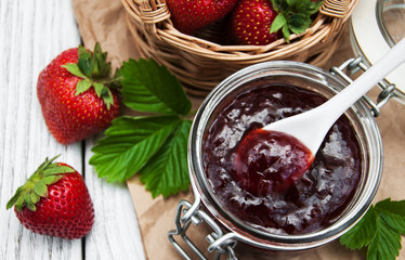 Strawberry jam and fresh strawberries