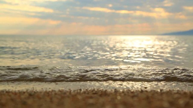 the waves rolled ashore