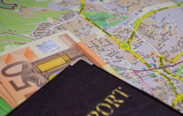 Planning a trip in Ukraine passport on city map with euro