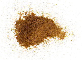 Turmeric (Curcuma) powder pile isolated on white background, top view